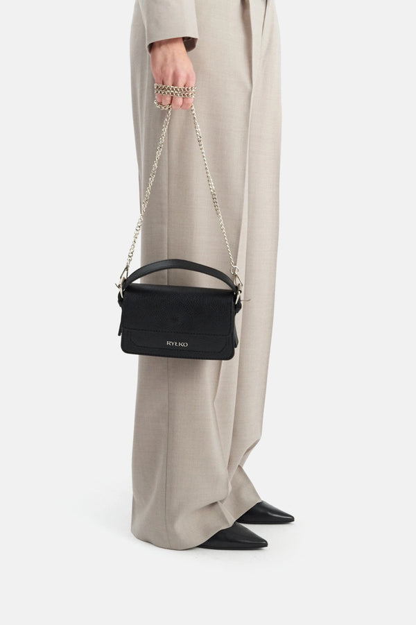 Small elegant handbag with chain strap