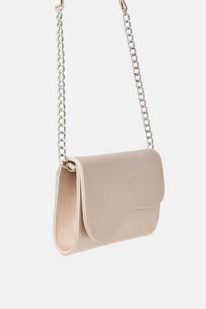 Platinum handbag with decorative flap