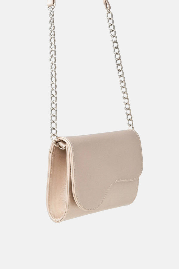 Platinum handbag with decorative flap