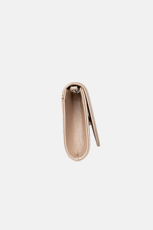 Platinum handbag with decorative flap