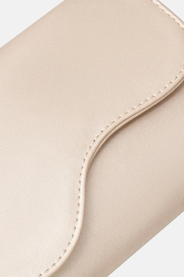 Platinum handbag with decorative flap