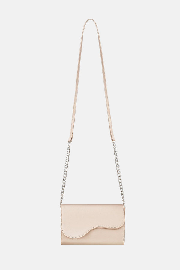 Platinum handbag with decorative flap